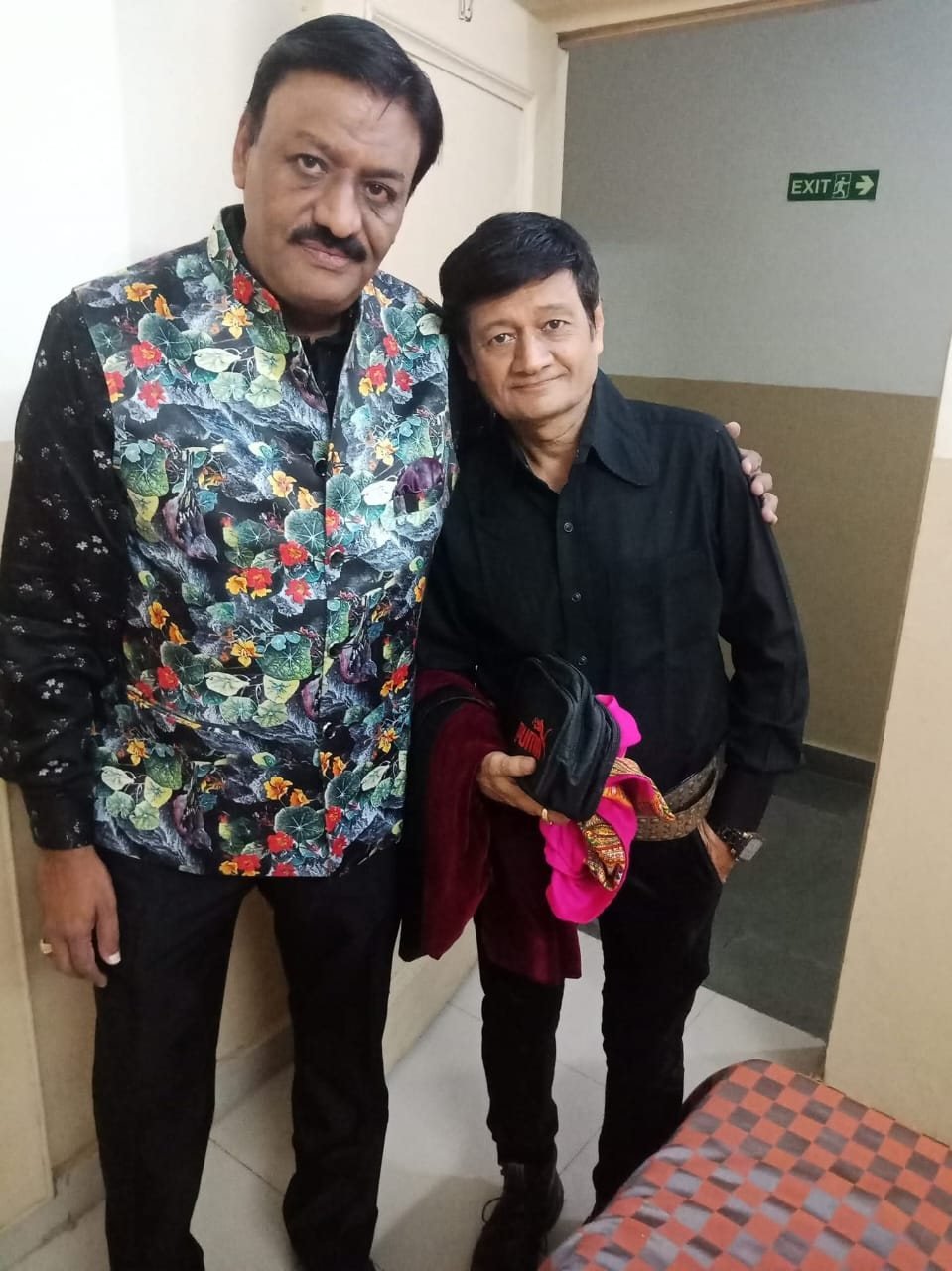 Candid photograph of the Star Musical Entertainer artist team at an event