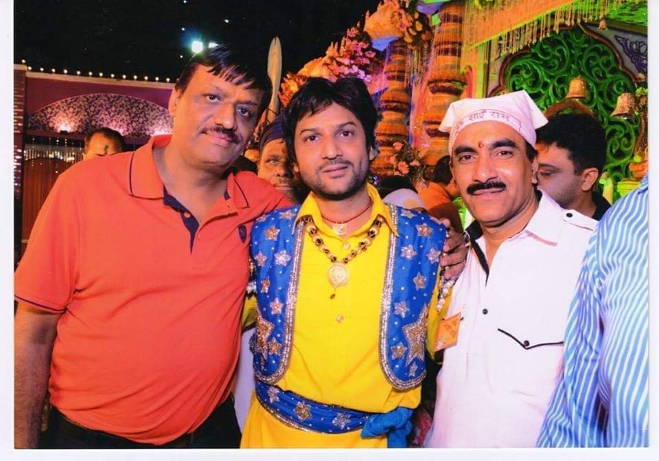 Costumed character performers posing during a themed event act