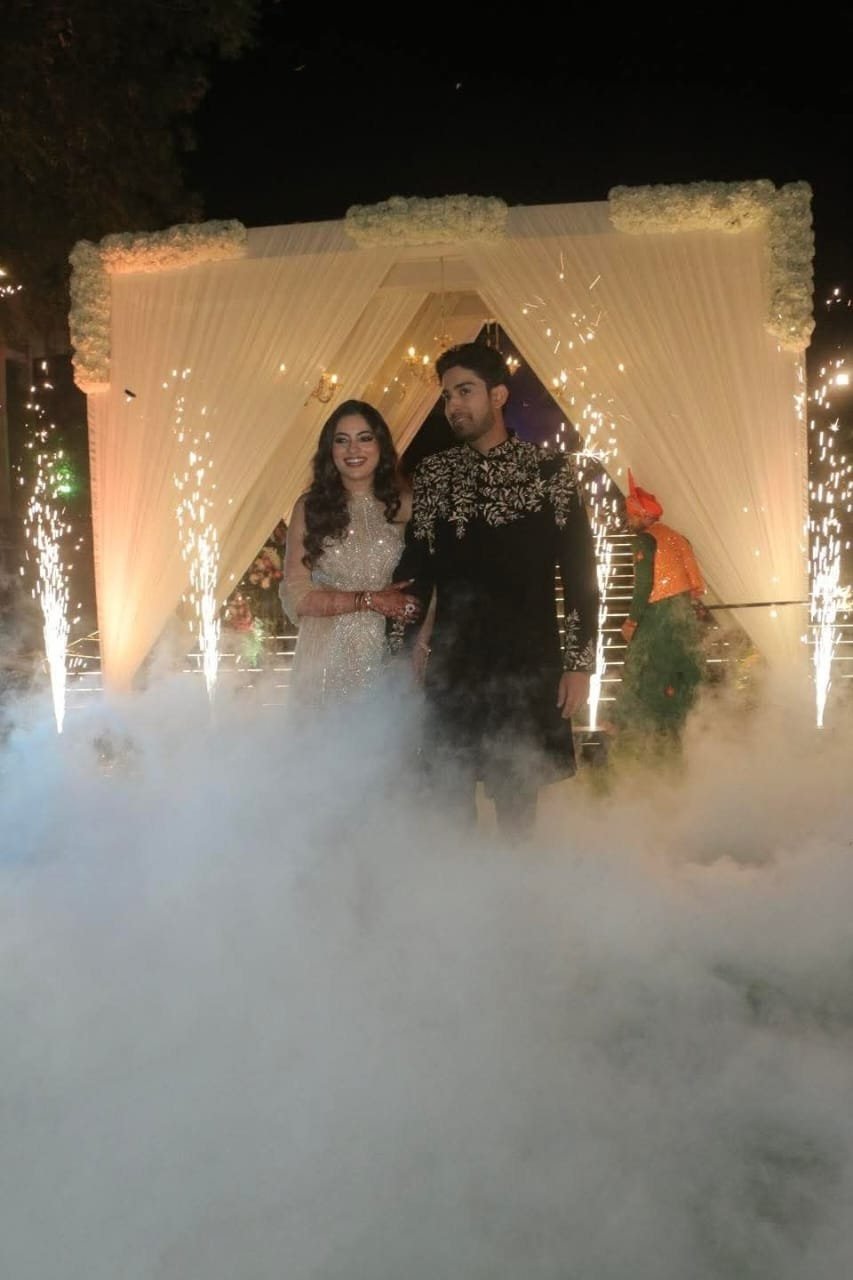 Wedding guests celebrating on the dance floor during the reception